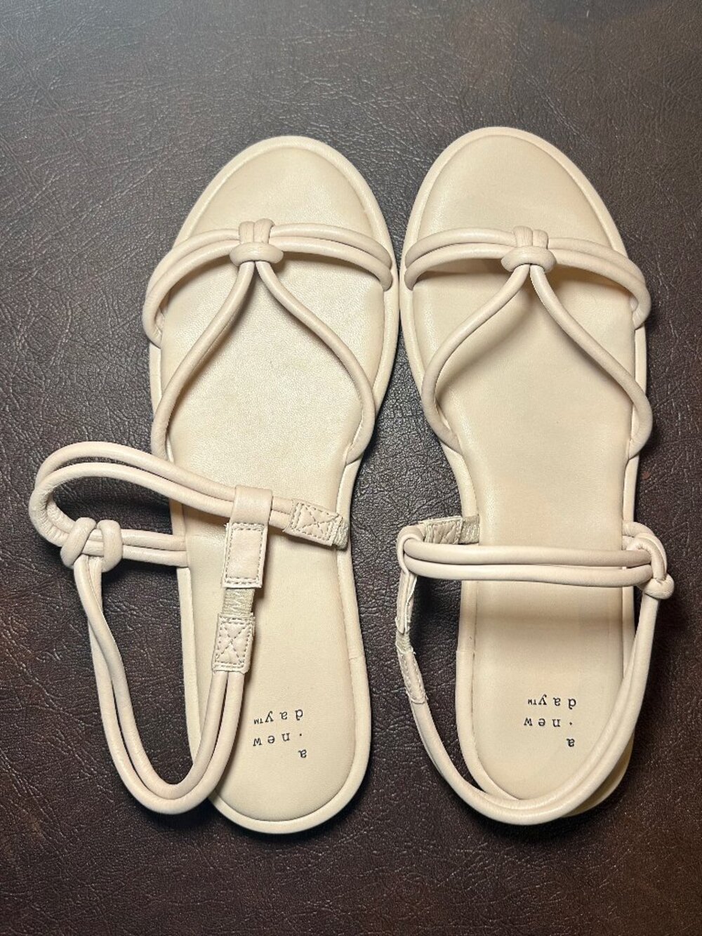A New Day Lara Ankle Strap Sandals w/an off-white color and knot details. Sz 9.5